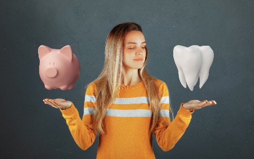 A woman stands with her hands out in front, palms facing up with a piggy bank hovering over one hand and a tooth hovers over the other. 