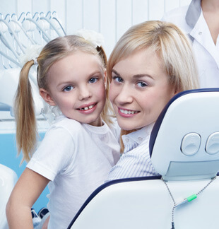 Young woman with straighter teeth post invisible braces