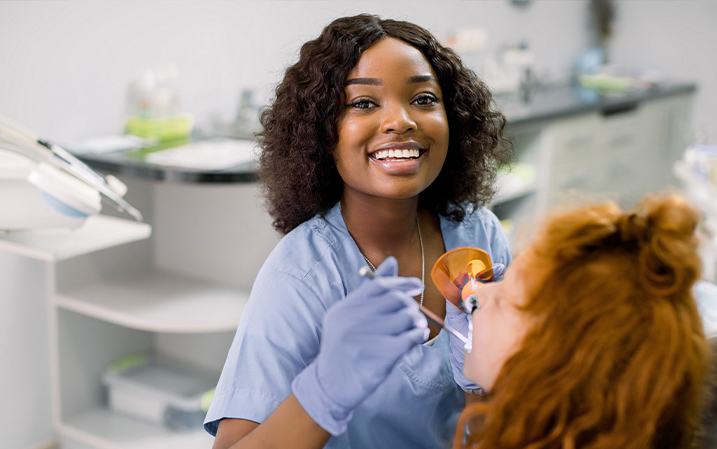 Dentist treating a patient's teeth