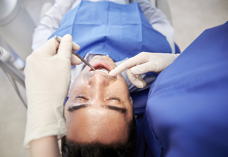 Dentist treating a patient's teeth