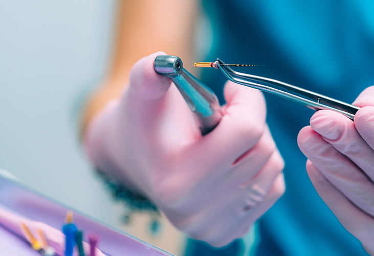 Dentist preparing for a root canal 